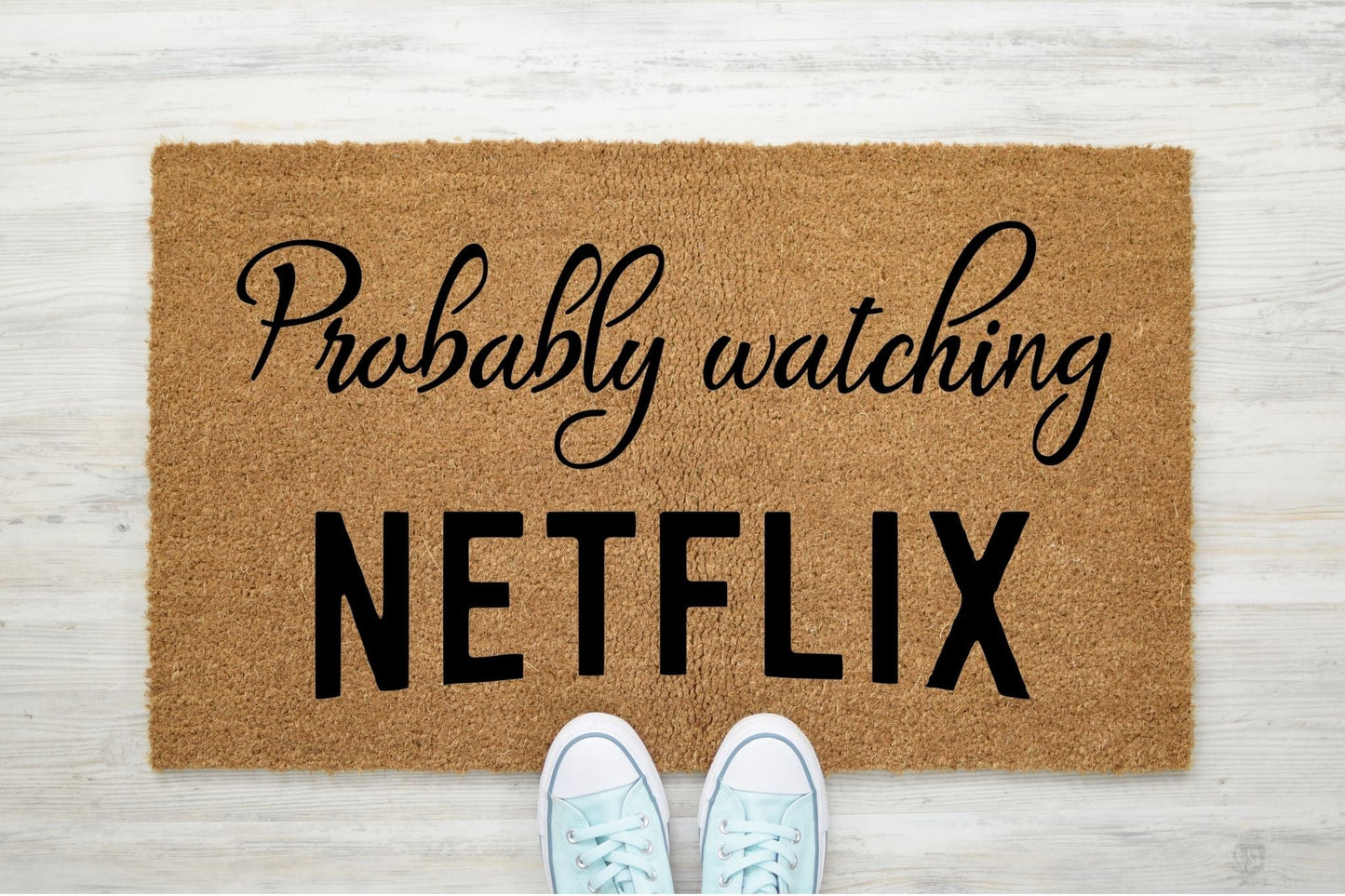 Probably watching Netflix doormat